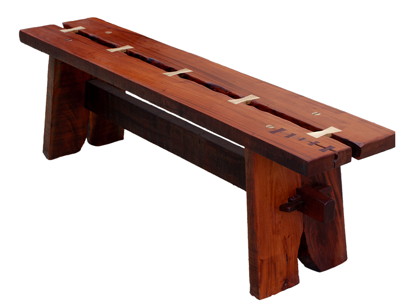 Mahogony split top bench using traditional joinery, with Maple and Purple Heart bowtie inlays, top diagonal view. 