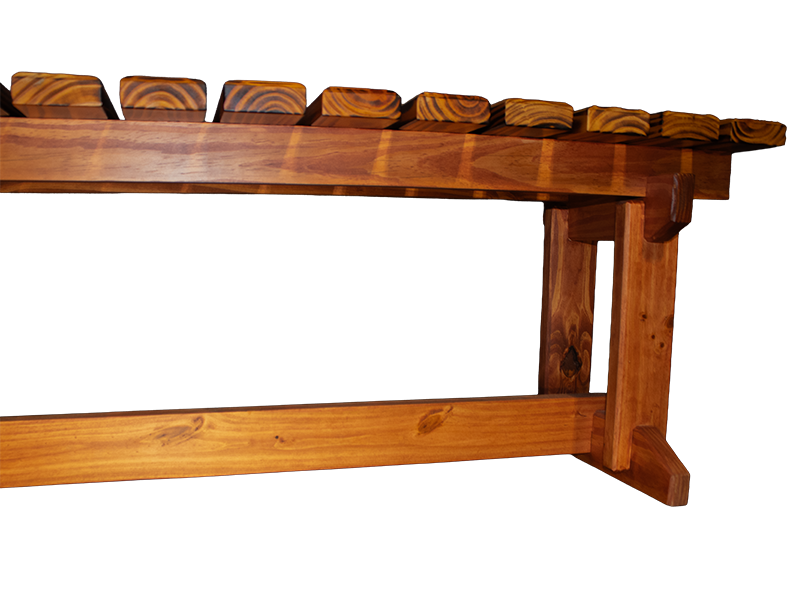 L-shaped slatted pine bench with amber top and dark walnut-stained base.